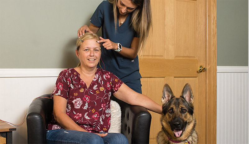 Jennifer Sampsom with patient and dog